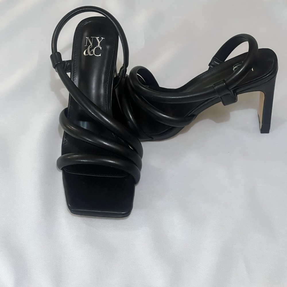 Heeled sandals by New York and Company in black.